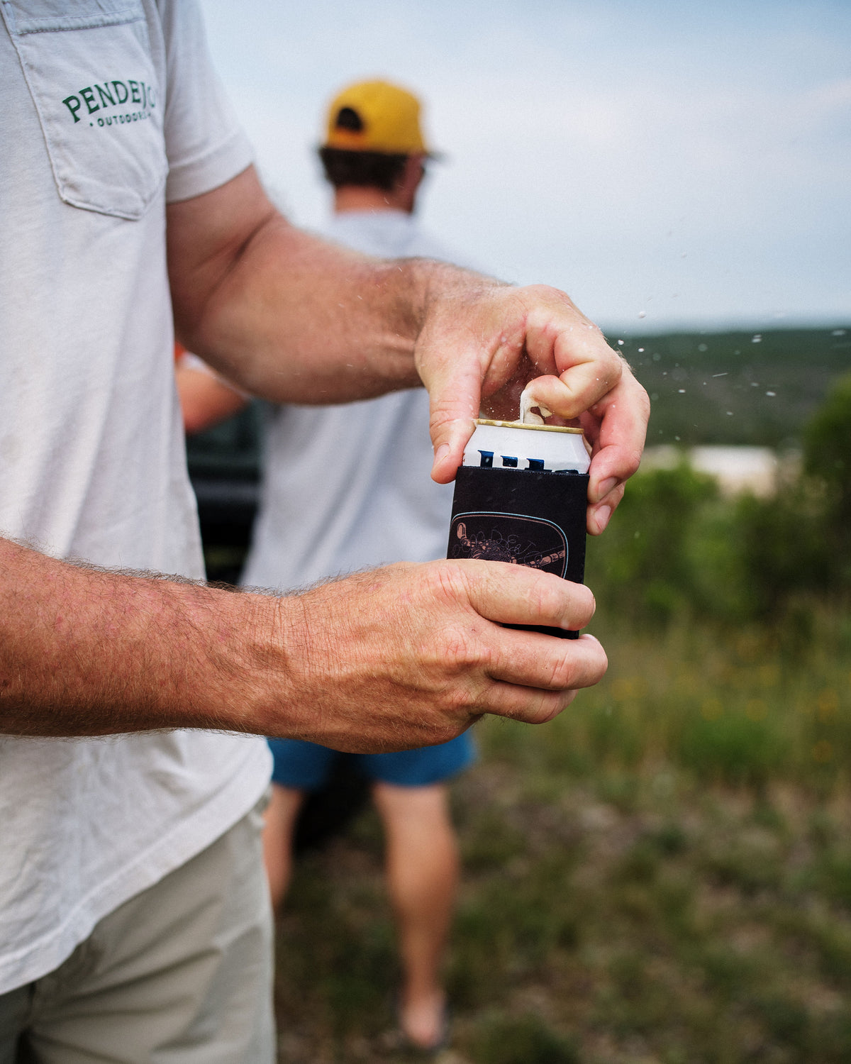 Cpt. Bob's Backlash Koozie, worn outdoors